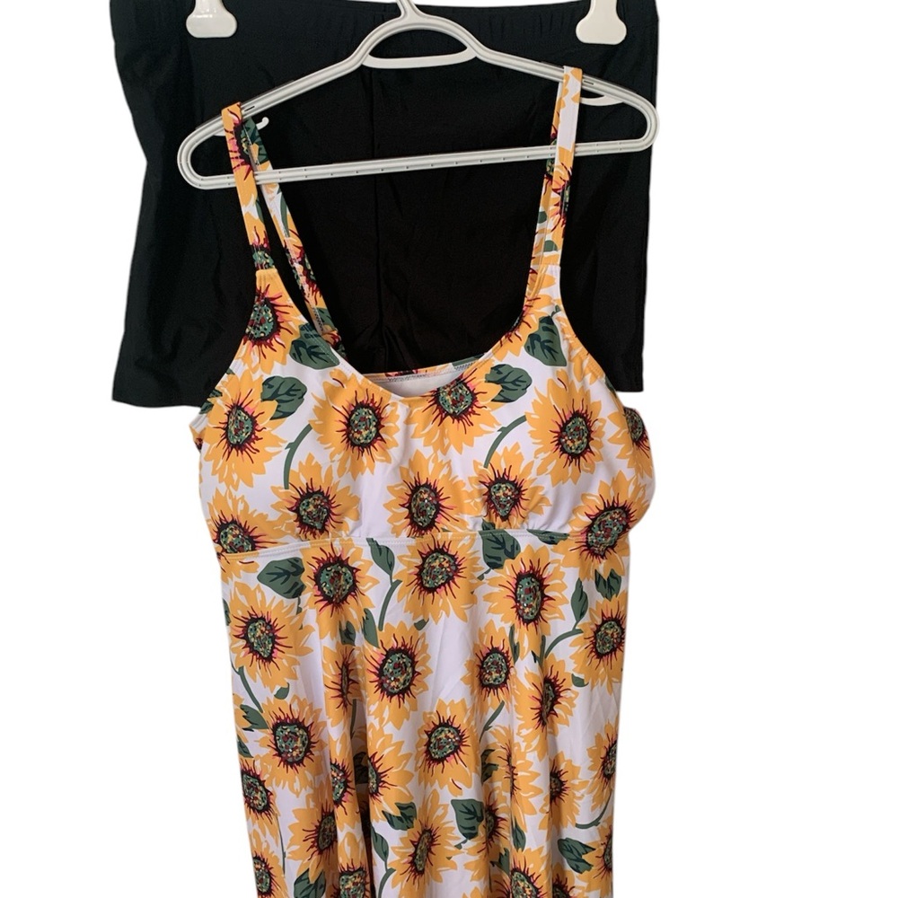 Sunflower Print tankini with black shorts to match.